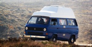 Blue campervan for surf holidays