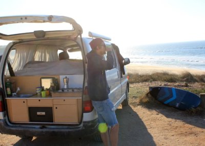 Morning mood next to campervan in surf holidays