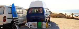 long term Campervans adventure surf lessons and surf boards on sunny beach praia Azul, Portugal, surf trip, surf course, surf with Atlantic Coast Campers