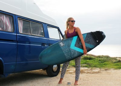 Girl smile in amazing roadtrip with campervan and surf days