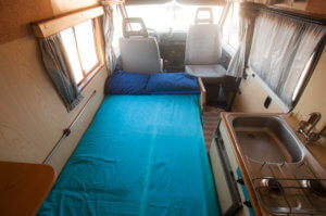 Interior campervan with big bed and fully equipped
