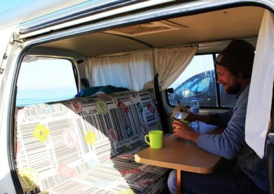 Morning coffe mood inside campervan in surf holidays